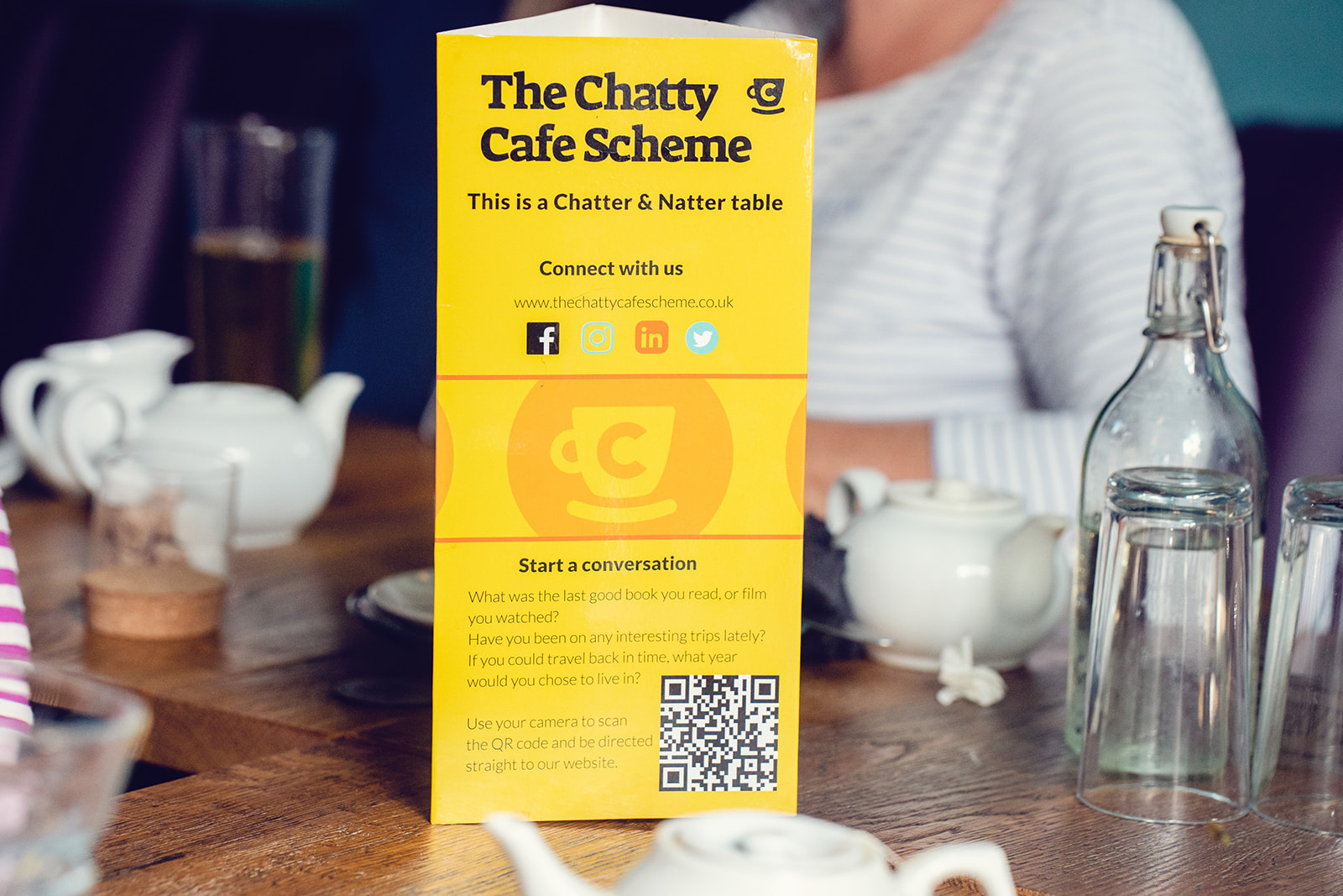 The Chatty Café scheme and table marker.